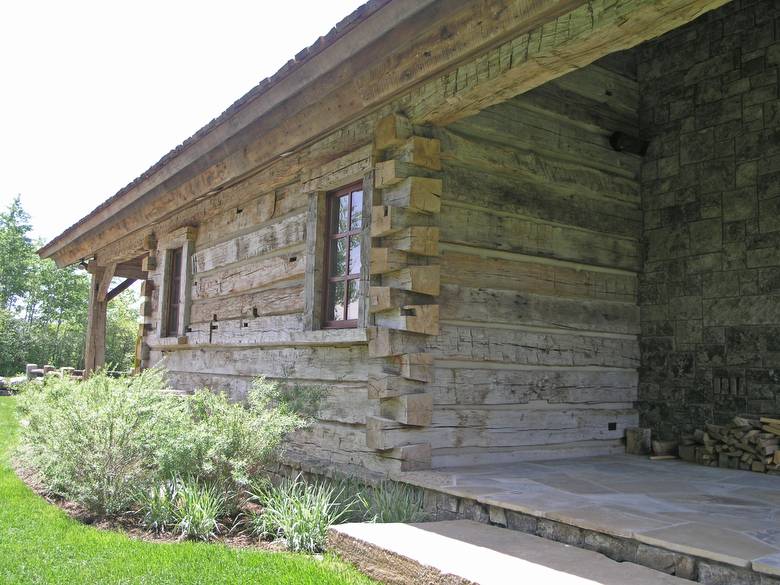 Hand-Hewn Timbers Stacked with Dove-Tail Joints